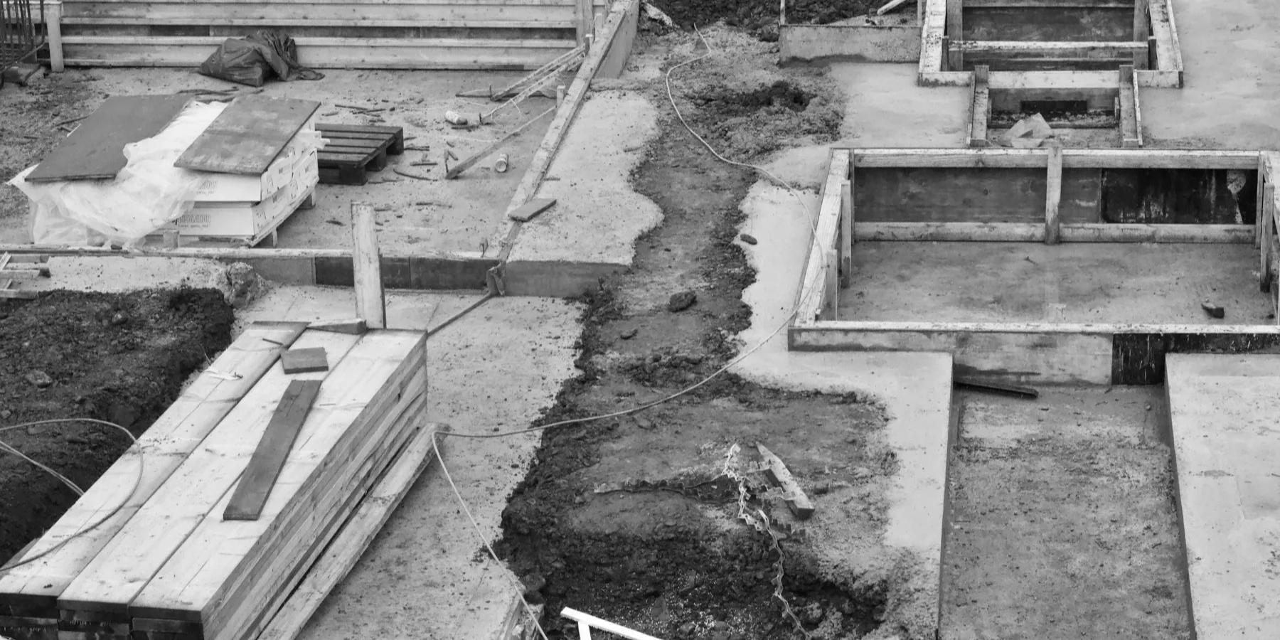 Concrete foundations set out on a construction site
