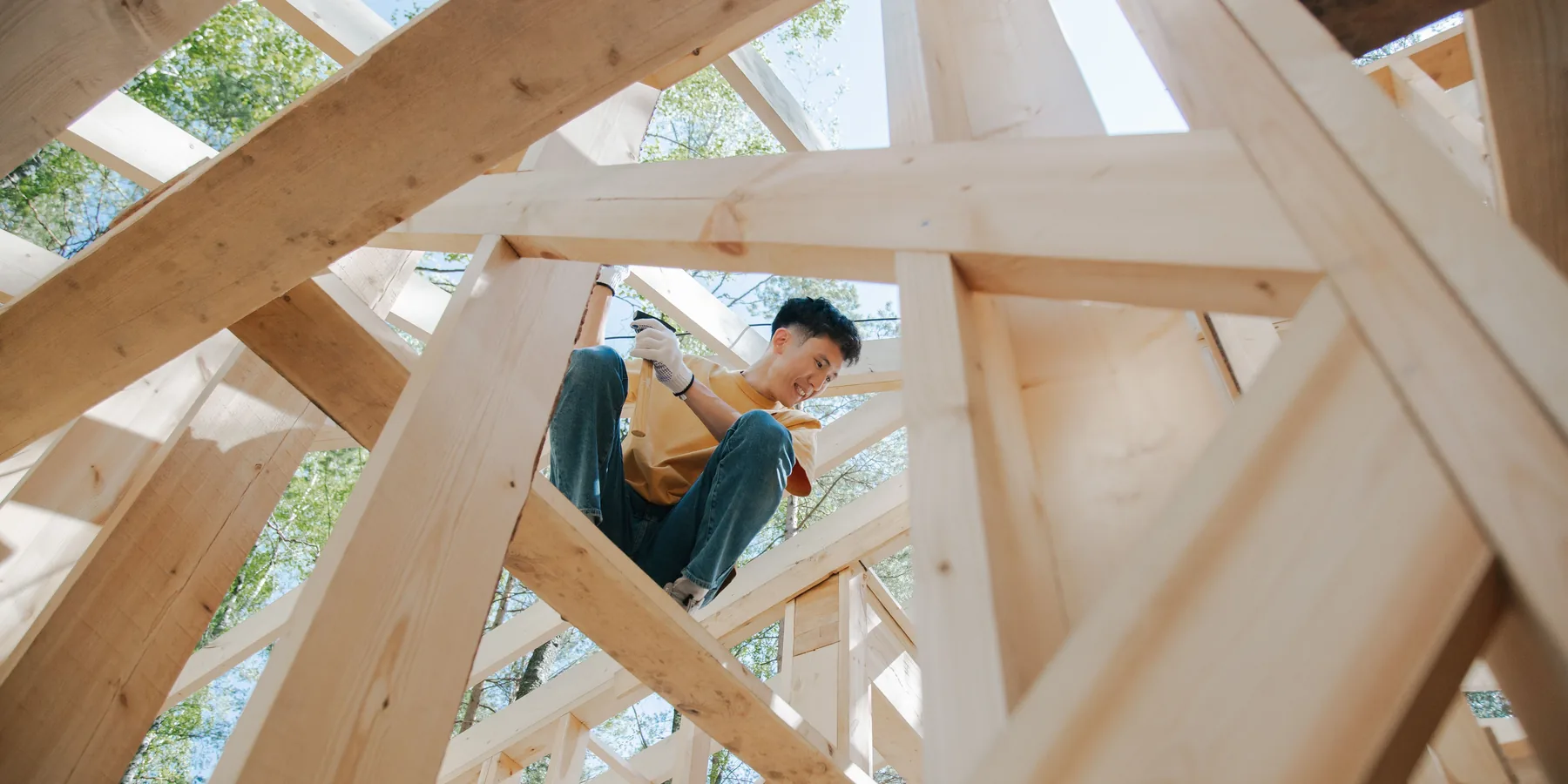 Deck joists on a beam, before the boards go down
