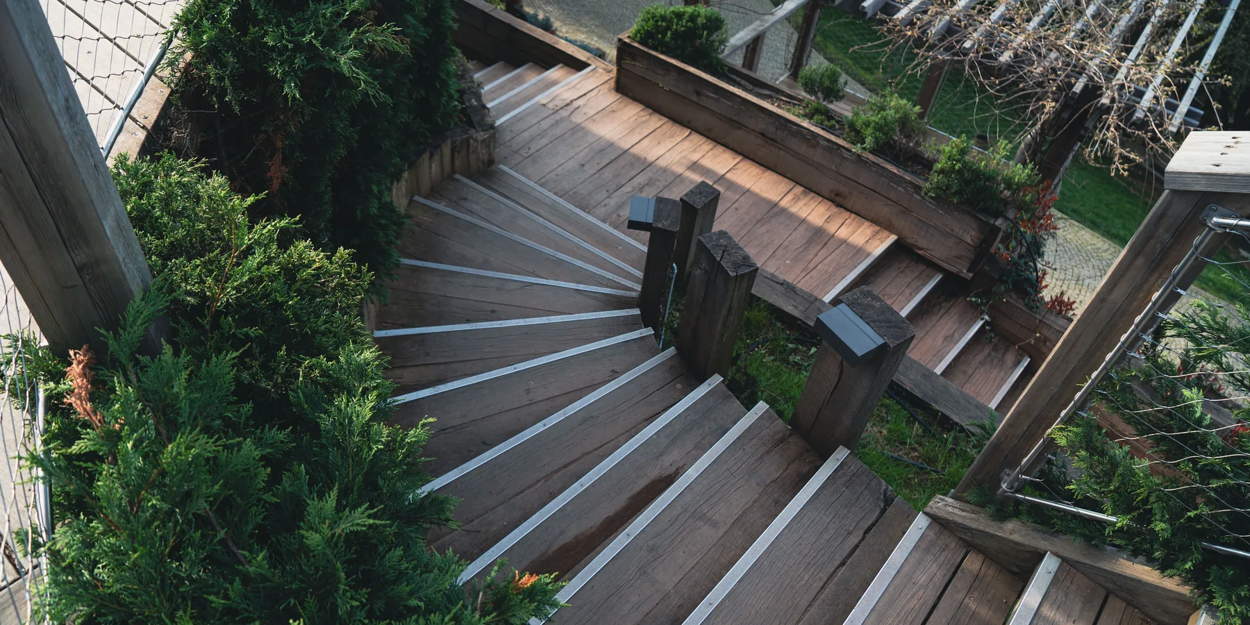 Wooden steps leading down from a deck