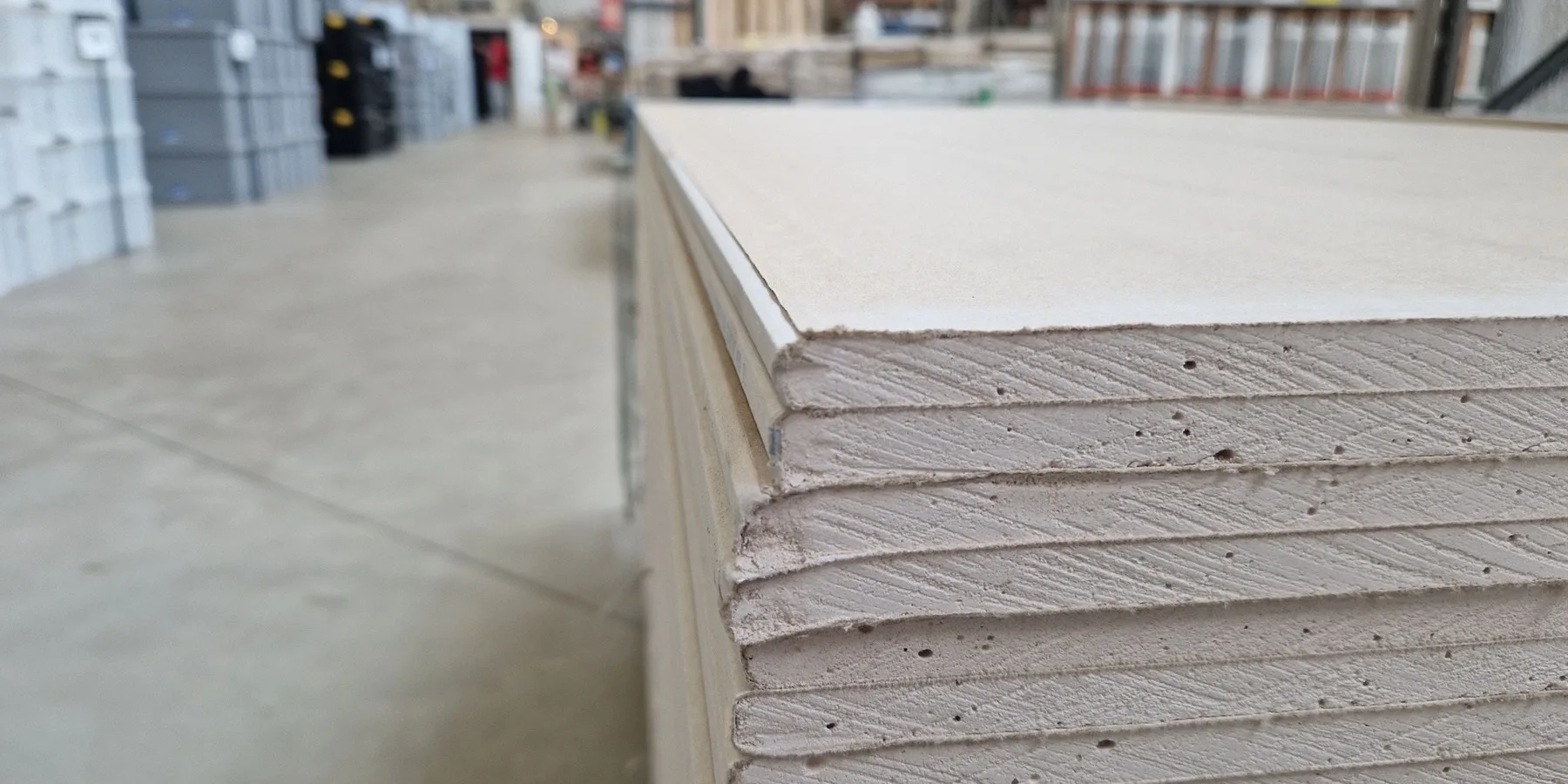 Drywall sheets stacked against a wall