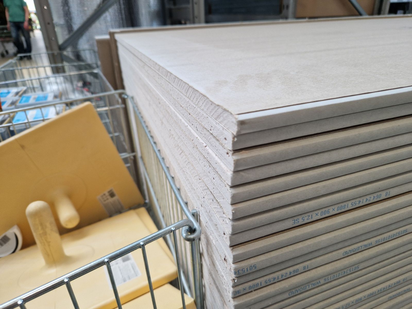 A stack of drywall sheets ready to hang