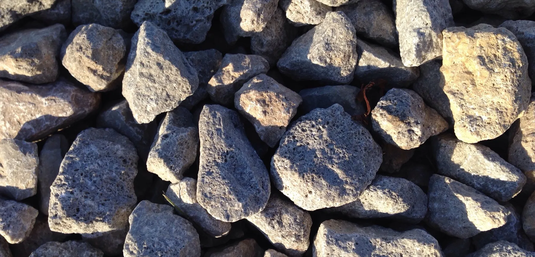 Crushed stone gravel spread over a prepared driveway surface