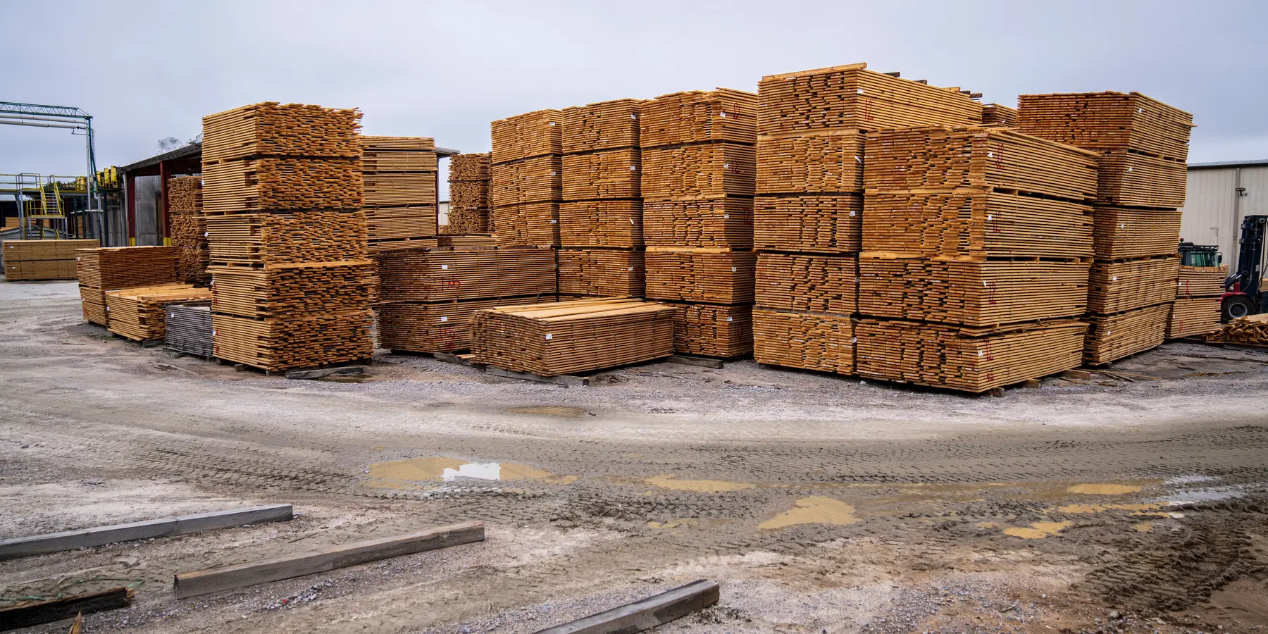 Stack of dimensional lumber showing the board ends